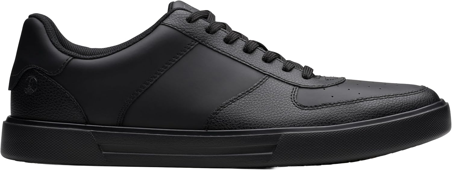 Pavo Monitor Arm installed on a wooden office desk