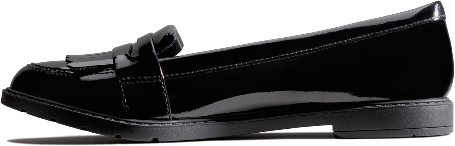 Pavo Monitor Arm installed on a wooden office desk