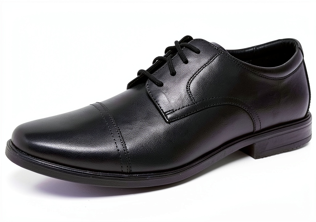 Clarks Lite Cap Oxford in tan leather on a wooden floor