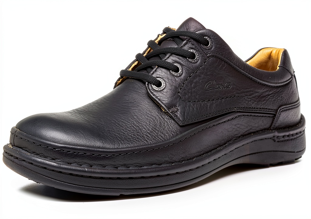 Clarks Nature Three trainers in mahogany leather on a neutral background